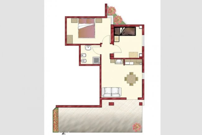 Piantina appartamento con salotto e camera.